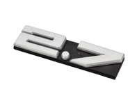 2.7 - Badge pour grille de ventilation arrière. Porsche 911 1973-74 - 91155901503, 91155901501, 911287-10-27